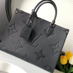 Louis Vuitton Black Embossed Leather Tote Bag
